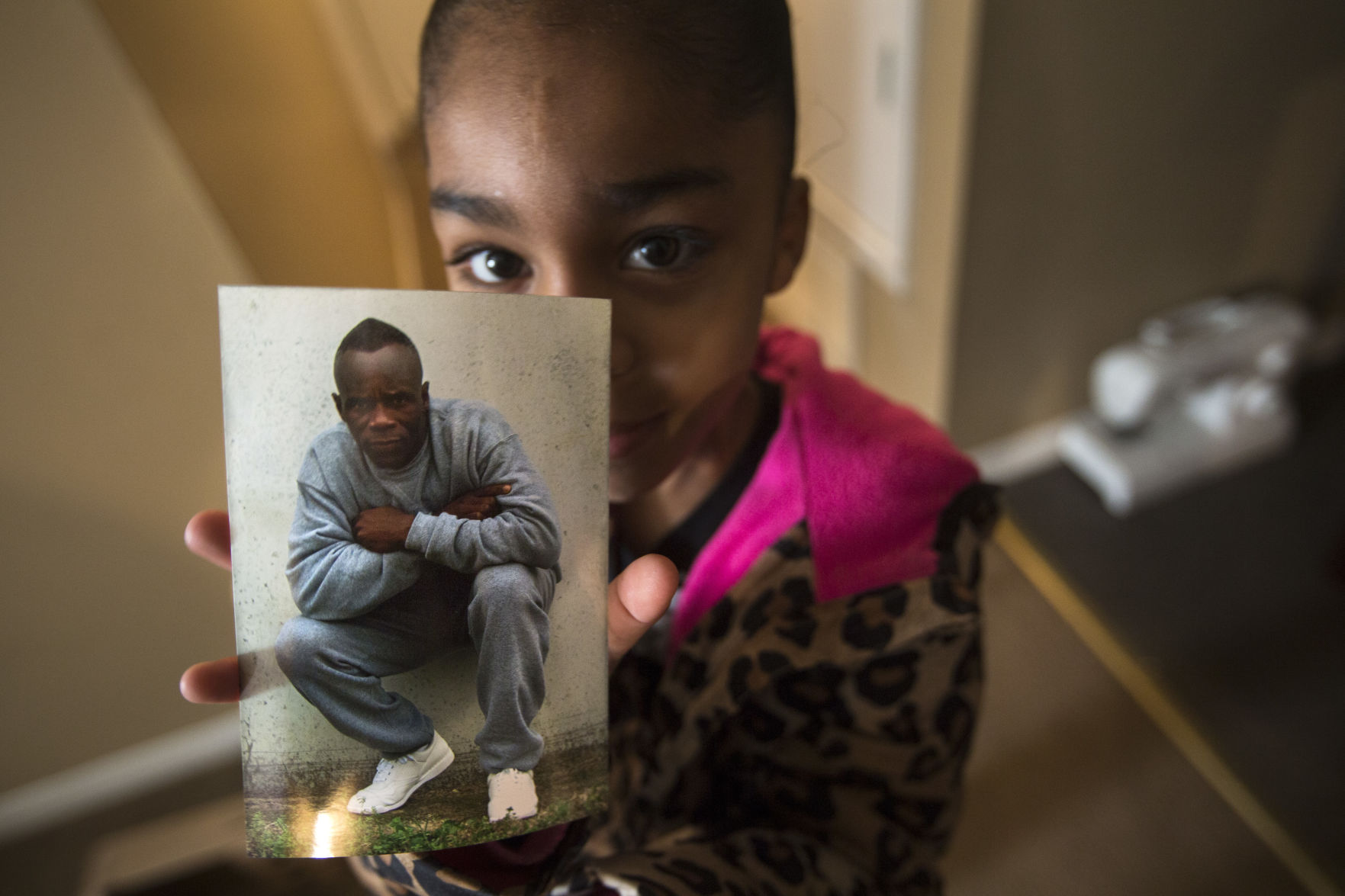 Jessiah Lindsley holding photo of Barry Green.JPG